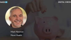 Mark Newman, Nomi Health_Doctor holding piggybank Photo by Panuwat Dangsungnoen/iStock/Getty Images Plus