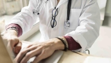 Doctor on a computer