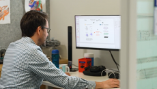 DT-GPT lead researcher and UniMelb A/Prof Michael Menden using a desktop computer