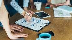 People reviewing financial data