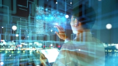 Person looking at digital images on a wall