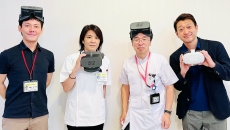Representatives from Jolly Good and Aichi Medical University Hospital's Pain Center wear the Jolly Good VR headset
