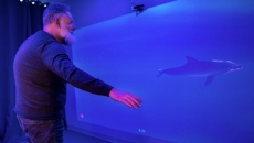 A man playing MindMaze's MindPod game.