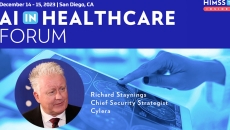 Richard Staynings at Cylera_Doctor looking at brain scan on table Photo: katleho Seisa/Getty Images