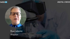 Russ Lebovitz, AmprionScientist_using microscope Photo by Chokniti Khongchum/pexels