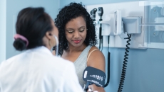 A person getting a blood pressure check during a medical appointment