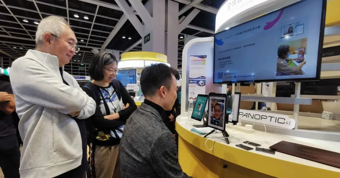 A person using PanopticAI's mobile application in a showcase in Hong Kong