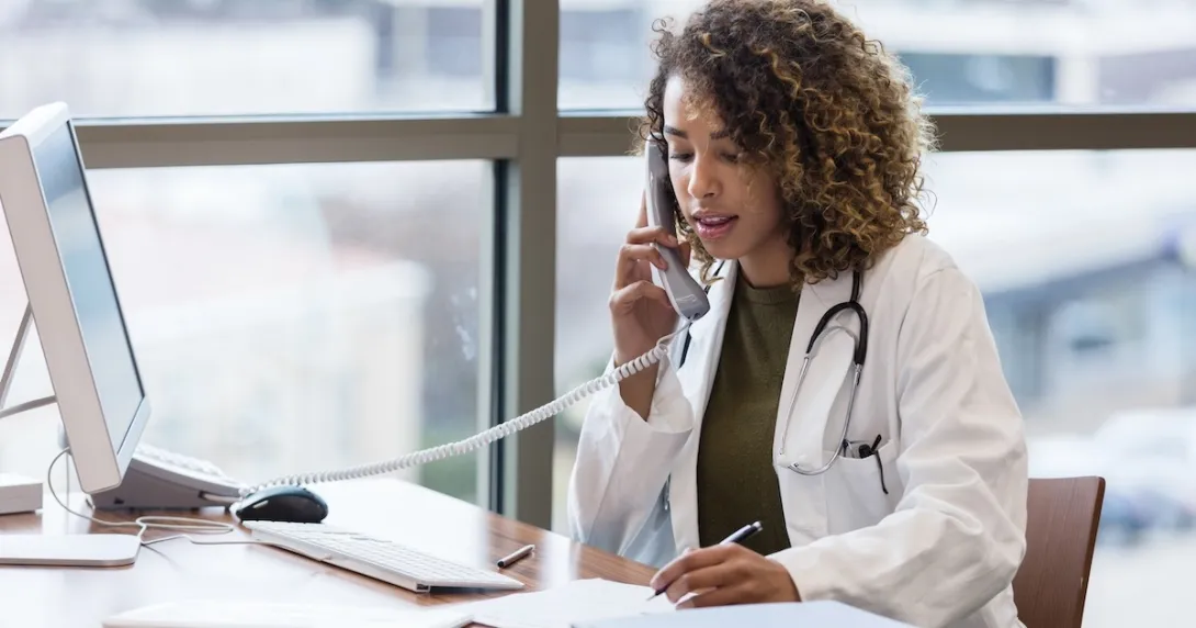 Healthcare professional talking on the telephone