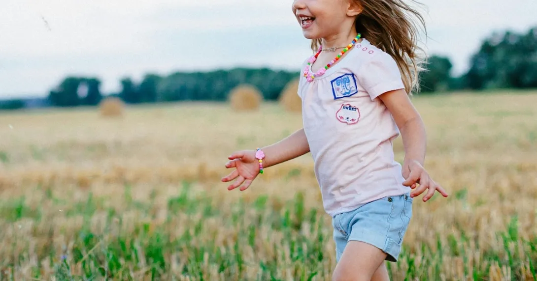 A child running in a field
