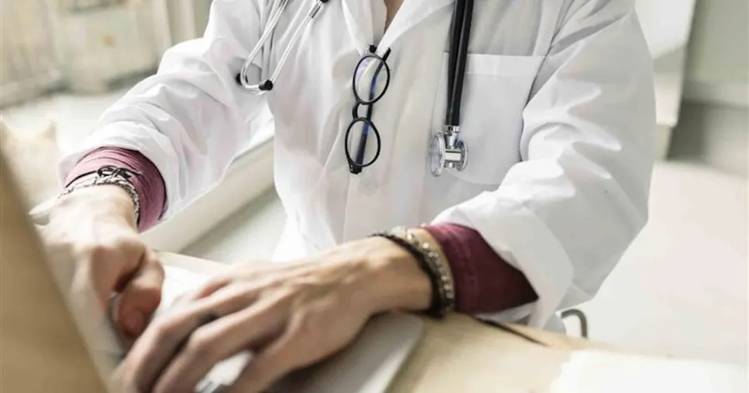 Doctor on a computer