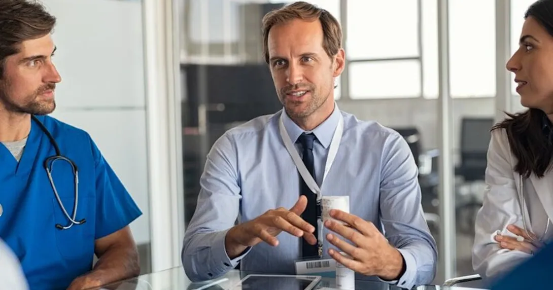 Clinician consulting with colleagues