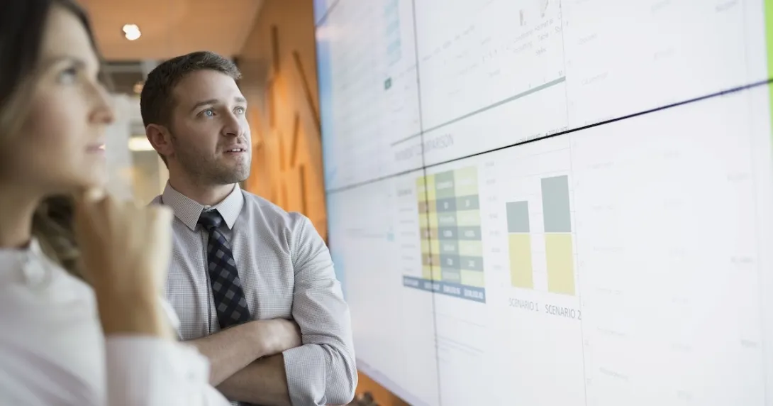 Executives reviewing data