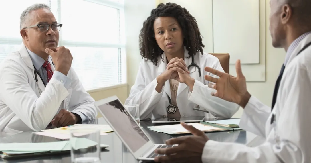Healthcare professionals conferring