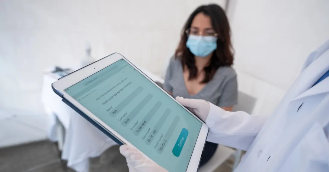 A patient being registered into a digital database