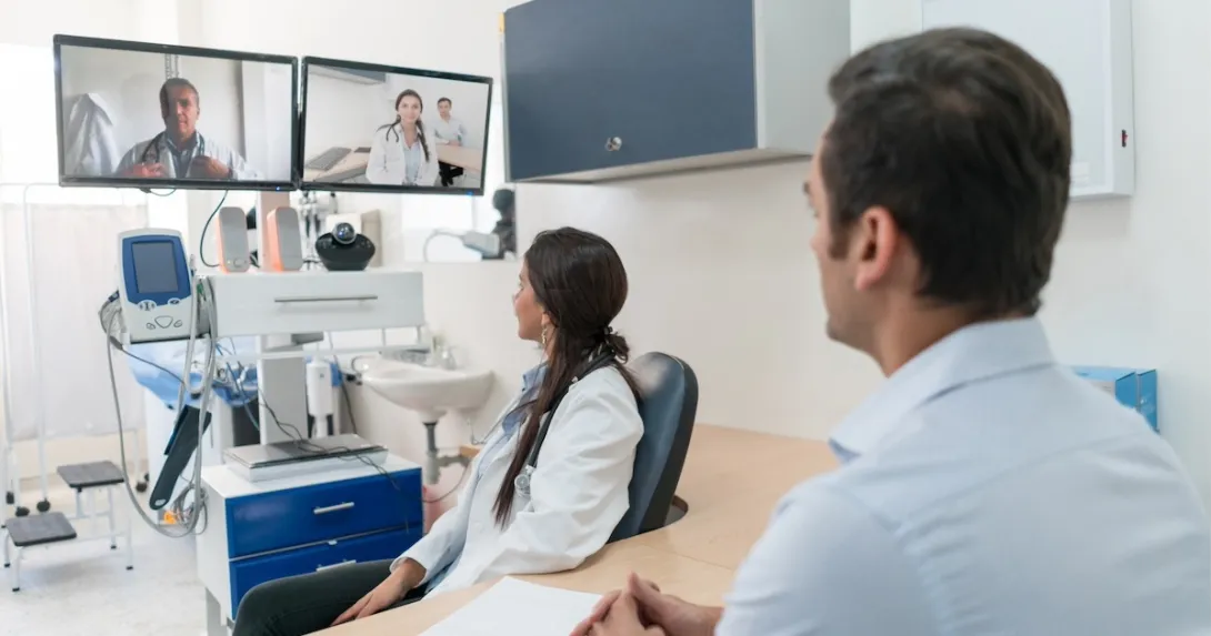 Clinicians interacting via interactive TV screens