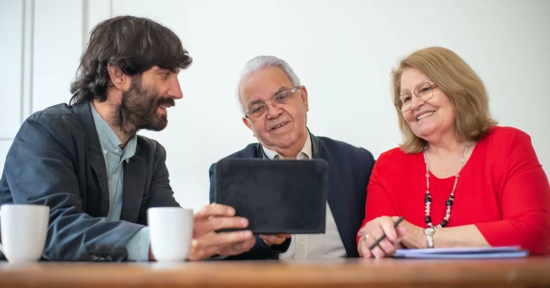 An agent discussing insurance packages with prospective clients