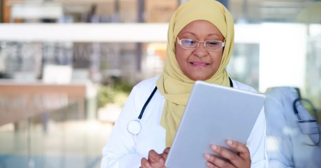 Healthcare provider on a tablet